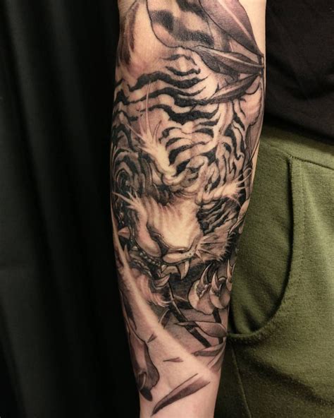 Colored japanese tiger tattoo on left half sleeve. Tiger sleeve in progress #chronicink #tiger # ...