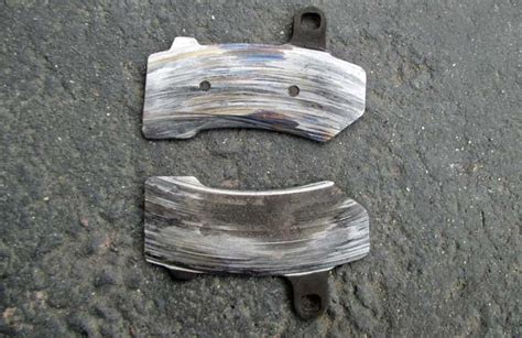 Push the pads from the top of the caliper body and out through the bottom of the caliper. Worn brake pads - BikesRepublic