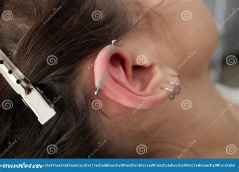 Stretched Lobe Piercing Grunge Concept Pierced Woman Ear With Black