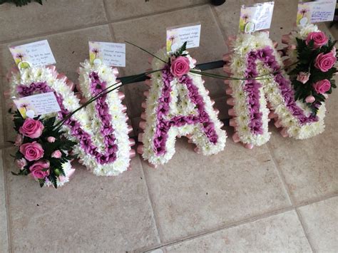 A funeral webcast is where a funeral or memorial service is streamed (broadcasted) live over the internet. NAN letter tribute funeral flowers by Lily White Florist ...
