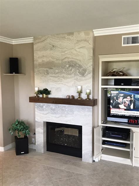Floor to ceiling fireplace cost. HRC added a floor to ceiling tile surround to the ...