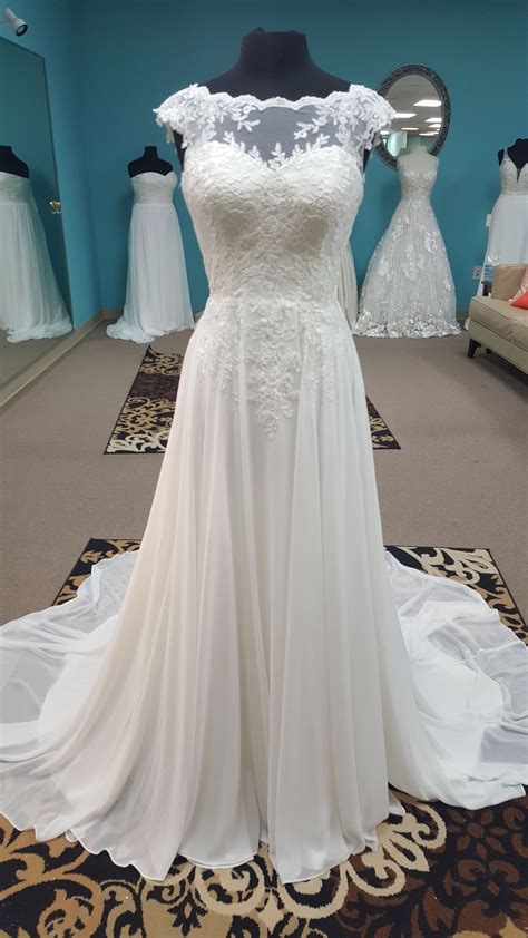 Https://tommynaija.com/wedding/sheer Overlay Wedding Dress