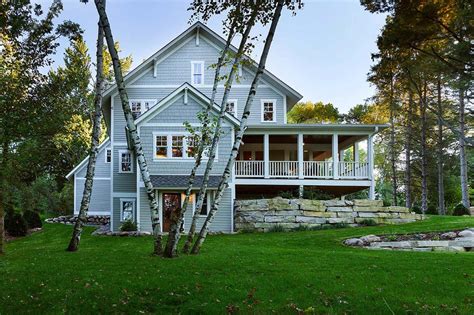 Charming Lakeside Farmhouse Nestled On A Wooded Site In Minnesota