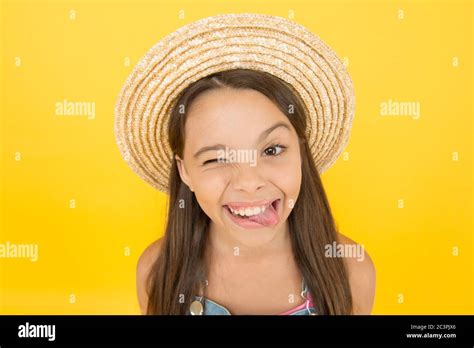 Happy Cheerful Kid In Summer Hat Yellow Background Funny Grimace