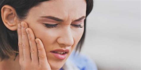 O que causa dor de dente latejante e como é tratado Exenin