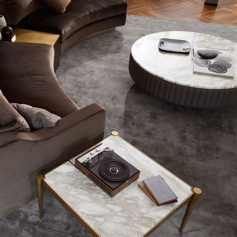 These days you can find them in a variety of styles and price ranges! Italian Leather Upholstered Round Marble Coffee Table in 2020