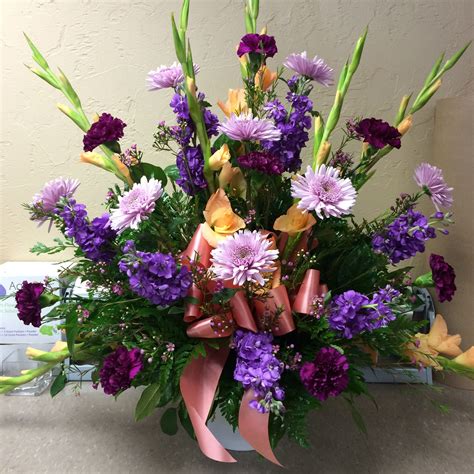 We did not find results for: Traditional urn with salmon glads, lavender cremons ...