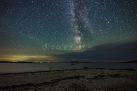 Milky Way And Night Sky Over St Cwyfans Church At Anglesey Wales Stock