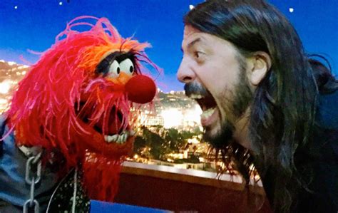 Its Animal Vs Dave Grohl In An Epic Drum Battle Fanbolt