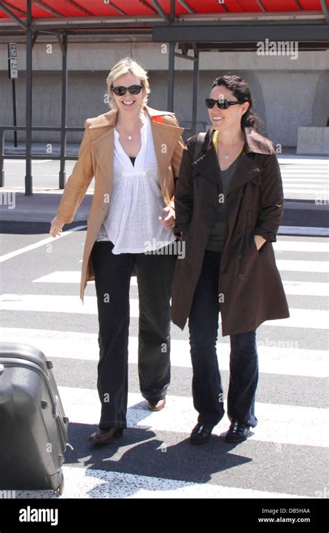 Jane Lynch And Dr Lara Embry Arriving At Washington Dulles Airport They Flew Into Dc For The