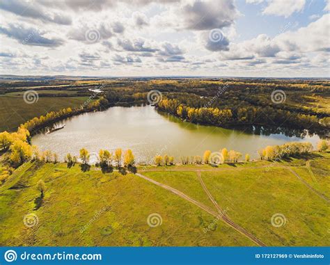 Aerial View Of Blue Lakes And Green Forests On A Sunny Summer Day