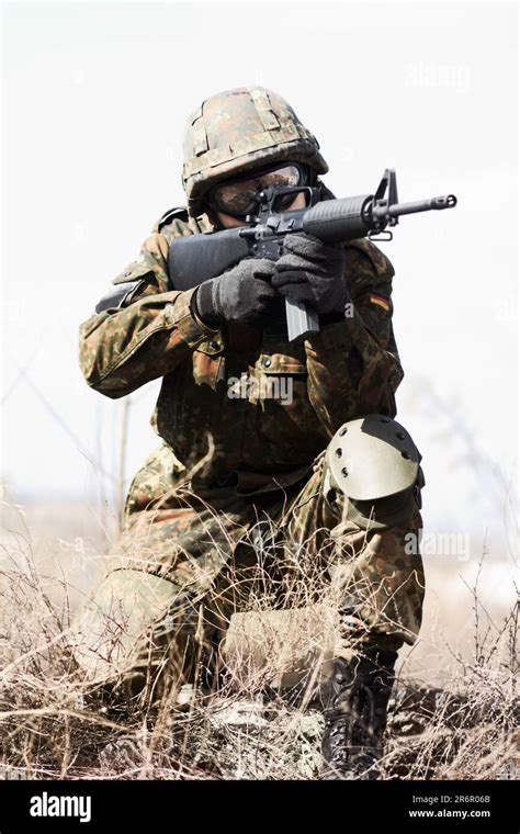 Soldier Man Machine Gun And Outdoor With Aim Field And Nature For War