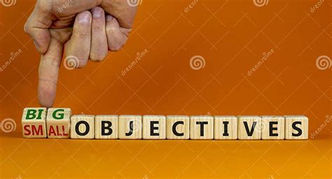 Big Or Small Objectives Symbol Businessman Turns Wooden Cubes Changes