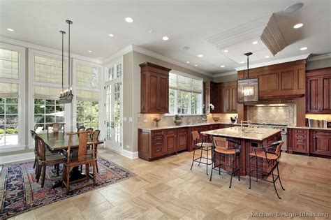 Kitchens with cherry wood cabinets offer a warm and luxurious look and match well with a variety of different countertop materials and finishes. Pictures of Kitchens - Traditional - Dark Wood Kitchens ...