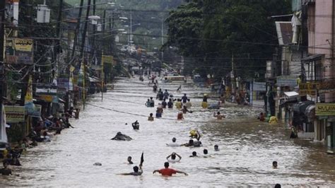 Philippine Floods Nineteen Dead As Rain Continues Bbc News