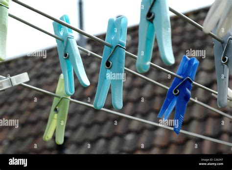 Colourful Clothes Pegs On A Washing Line Stock Photo Alamy