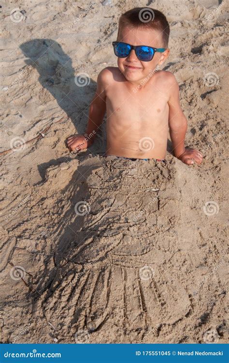 Portrait Of A Boy Buried In Sand Stock Image Image Of Child