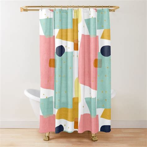 A Colorful Shower Curtain With Circles And Dots In Pastel Colors On A Wood Floor