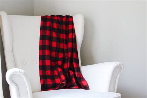 This Blanket Is Made With Flannel Fabric Featuring A Medium Size Red