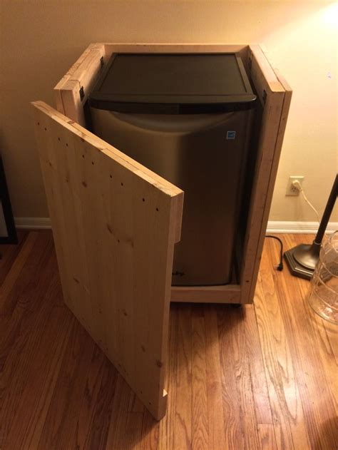 This video is about building a diy kegerator from magic chef 4.4 cu ft mini fridge. Danby DAR044A6BSLDB Kegerator Cabinet Build | Kegerator cabinet, Diy home bar