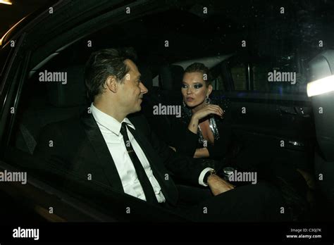 jamie hince and kate moss arriving at simon cowell s 50th birthday party in north london london
