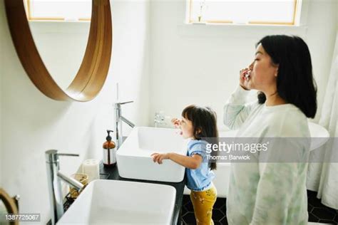 Asian Mom Bath Photos And Premium High Res Pictures Getty Images