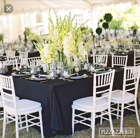 Pin By Sugi On Centerpieces Black Tablecloth Wedding White Chairs Wedding Black Tablecloth