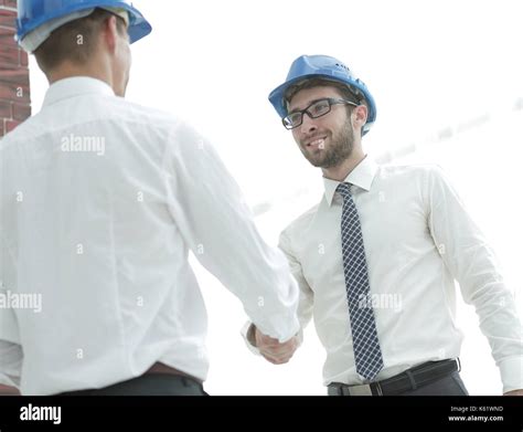 Handshake Architect And Civil Engineer Stock Photo Alamy
