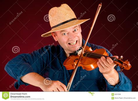 How do you hold the fiddle? Fiddle Player stock photo. Image of musical, fingerboard ...