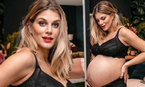 Pregnant Ashley James Looks Radiant In Lacy Lingerie As She Cradles Her