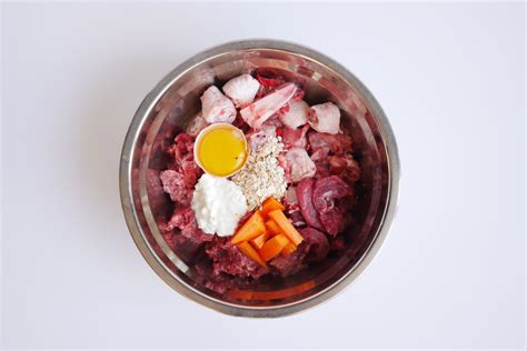 The cost of a raw dog food diet varies with the ingredients used and how it is prepared. Raw vs Kibble Dog Food: Which Diet is Best? | Canine Weekly