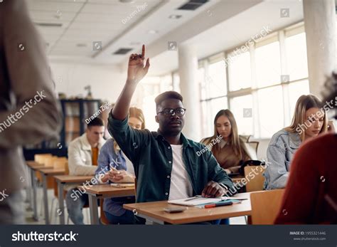 Woman Lecture Hall Raising Hand Over 473 Royalty Free Licensable Stock