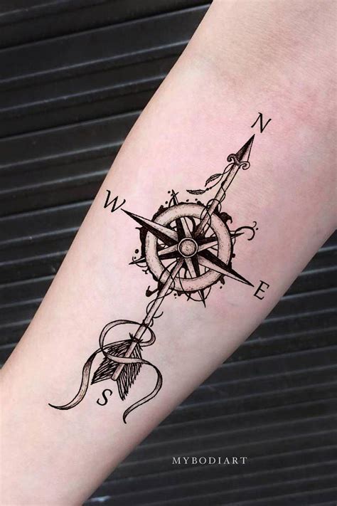 Https://tommynaija.com/tattoo/compass With Arrow Tattoo Designs