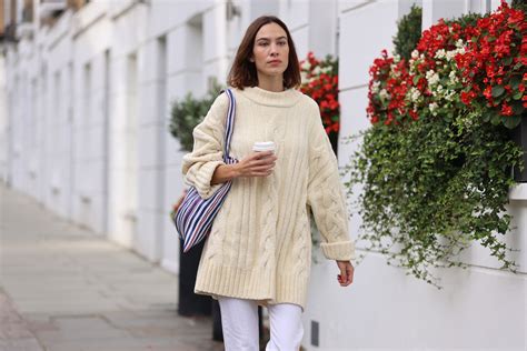 great outfits in fashion history alexa chung s cozy cable knit sweater fashionista