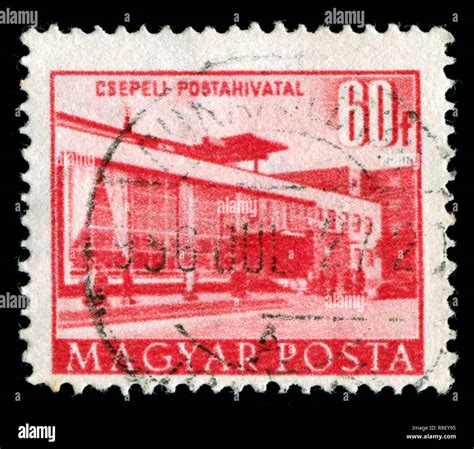 Postage Stamp From Hungary In The Buildings Of The Five Year Plan In