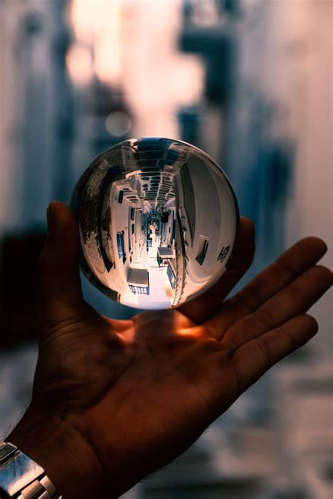 Free Person Holding Clear Glass Ball Nohatcc