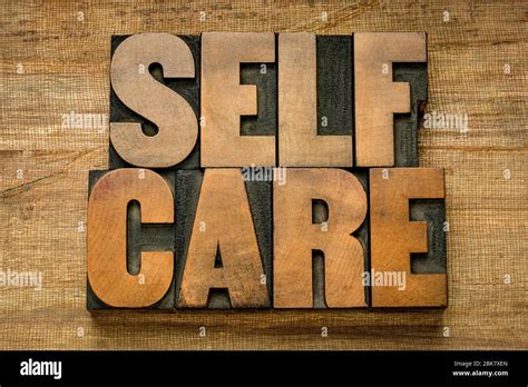 Self Care Word Abstract In Vintage Letterpress Wood Type On Grunge