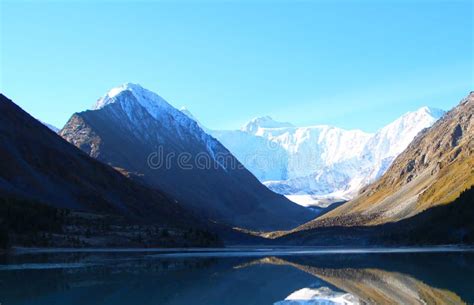 Blue Lake Among The Mountains Of The Altai Mountains Stock Image