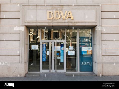 Bbva Banco Bilbao Vizcaya Argentaria Sa With People Walking Past On
