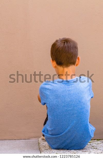 Sad Alone Boy Sitting On Ground Stock Photo 1223785126 Shutterstock