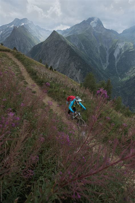 Woman Riding Mtb Downhill Singletrack In Les Deux Alps France By Stocksy Contributor Ibex