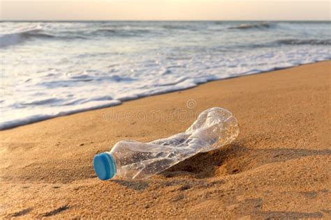 Plastic Bottle Garbage Waste On Sand Beach Garbage Rubbish On Beach