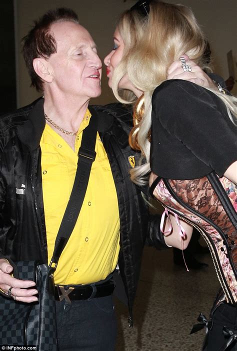 Gabi Grecko Showers Geoffrey Edelsten In Kisses At Melbourne Airport