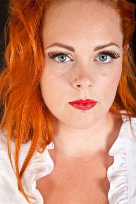 Red Hair Girl In Pin Up Style Portrait Shot In Studio Stock Image