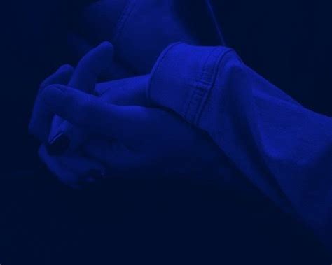 Holding Hands In Blue Loving Each Other In Purple And Being Together