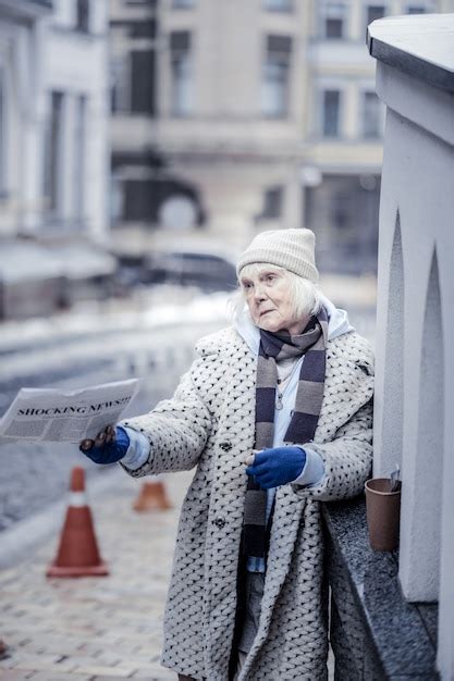 Premium Photo Fresh Newspapers Sad Unhappy Woman Holding A Morning