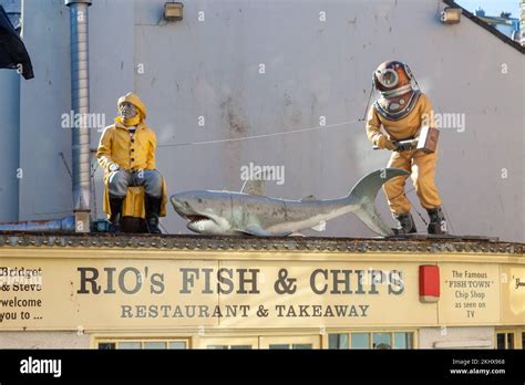 Rio's Fish & Chips, Brixham with life size models of fisherman, diver