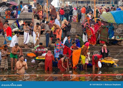 Bathing At The Hindu Ghats In The Holy River Ganges Varanasi India