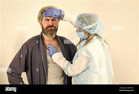 Nurse Woman Examine Patient Bio Hazard Having Cold Virus Caught Flu Disease Listen Heart