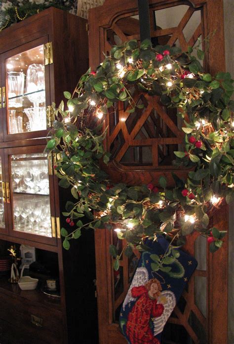 Two section construction and hinged branches add to ease of assembly. MAY DAYS: Christmas Living Room and Tree